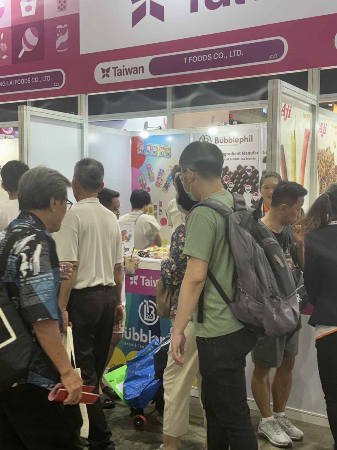 T Foods and BubblePhil booth in the Taiwan pavilion at a food trade show with visiting buyers